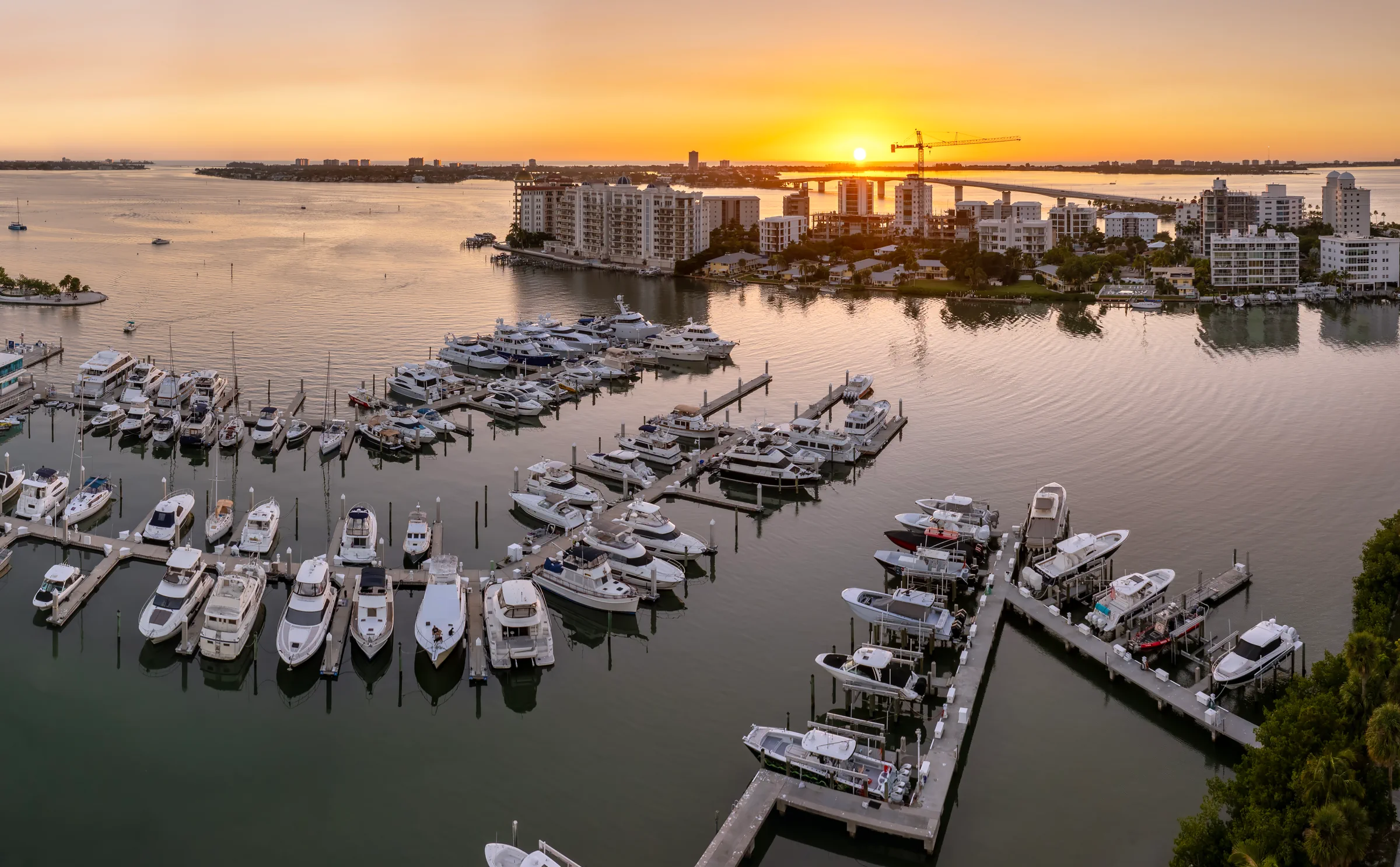 Aerial view of a marina at sunset